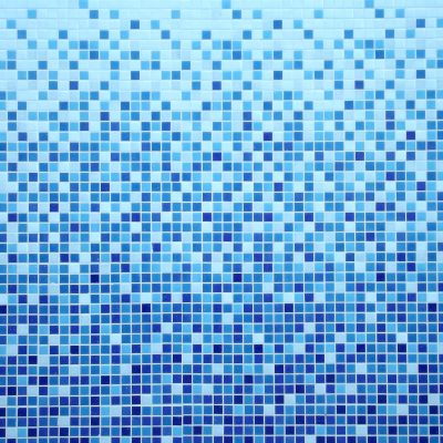Blue square pool tiles on a wall